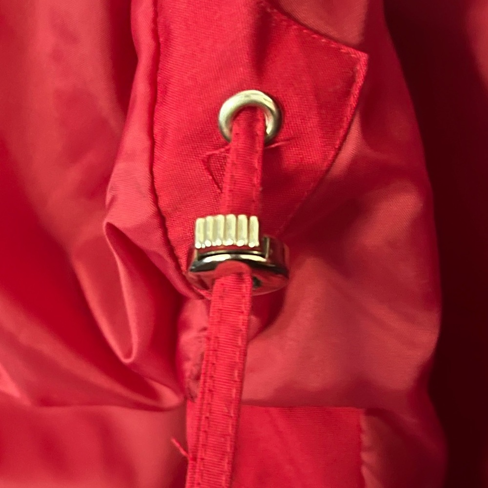 Red coat/jacket.Silver coloured adornments. Water repellent. Lined. Nautical - Picture 11 of 12
